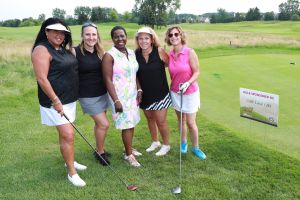 Committee member Kathy Makino, THAW CEO Saunteel Jenkins, and team