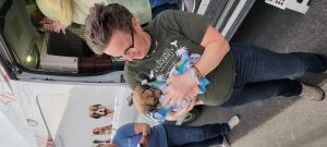 Joann Hennessy snuggles "Hennessey" namesake of her late mom  - Marie